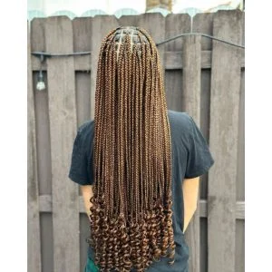 Knotless braids with curly ends
